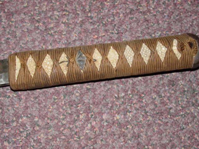 Wakizashi sword handle close up view