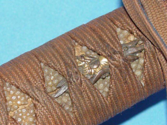 Civilian Menuki close view