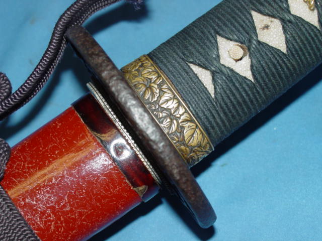 WWII Japanese militia sword Fuchi with leaf pattern