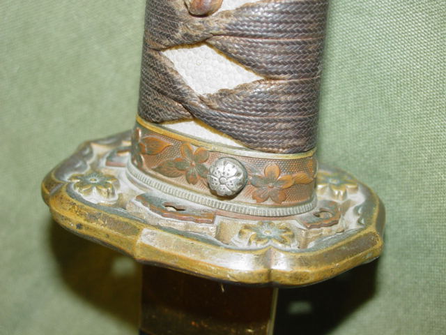 Samurai sword locking button