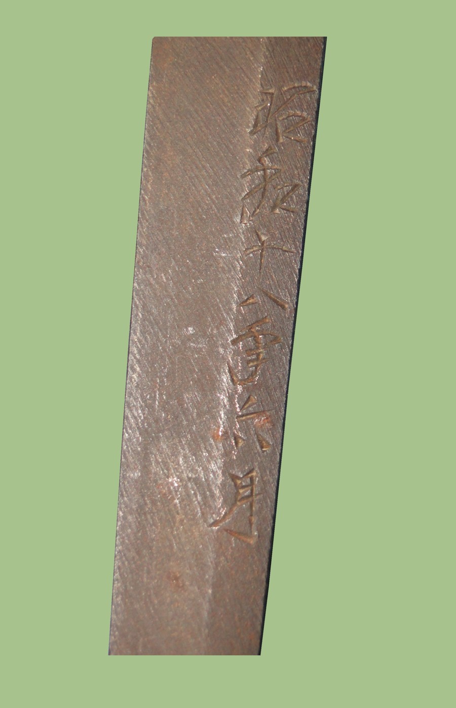 Close up view of date in Katana tang