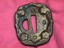 Close up view of a late WWII Tsuba Late WWII Samurai sword Tsuba
